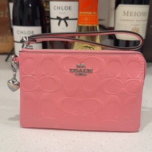 Wristlet in Signature leather with Heart charm 💖